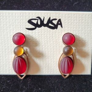 Carole Sousa red earrings.